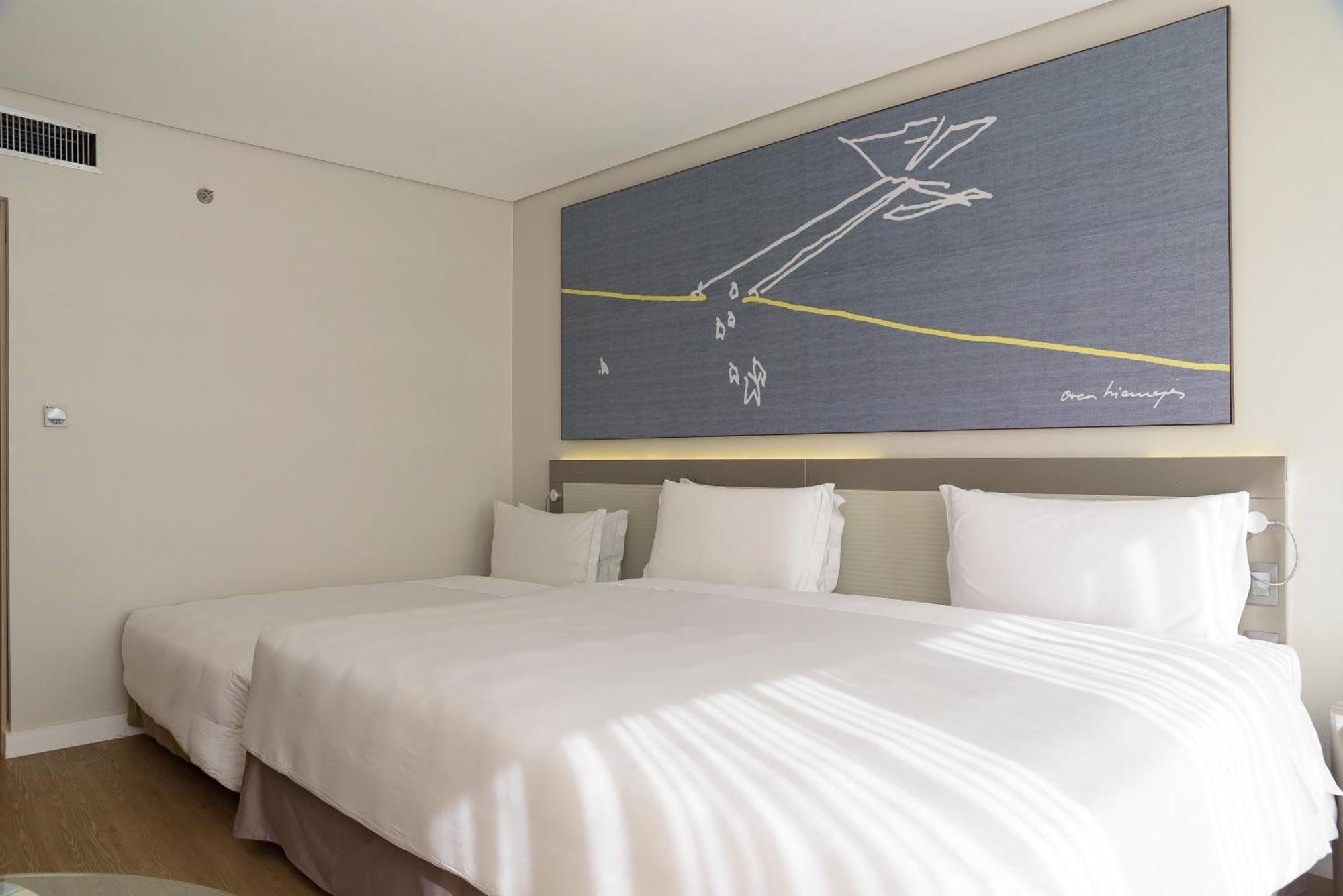 로열 튤립 브라질리아 알보라다 호텔 객실 사진 A room at the hotel